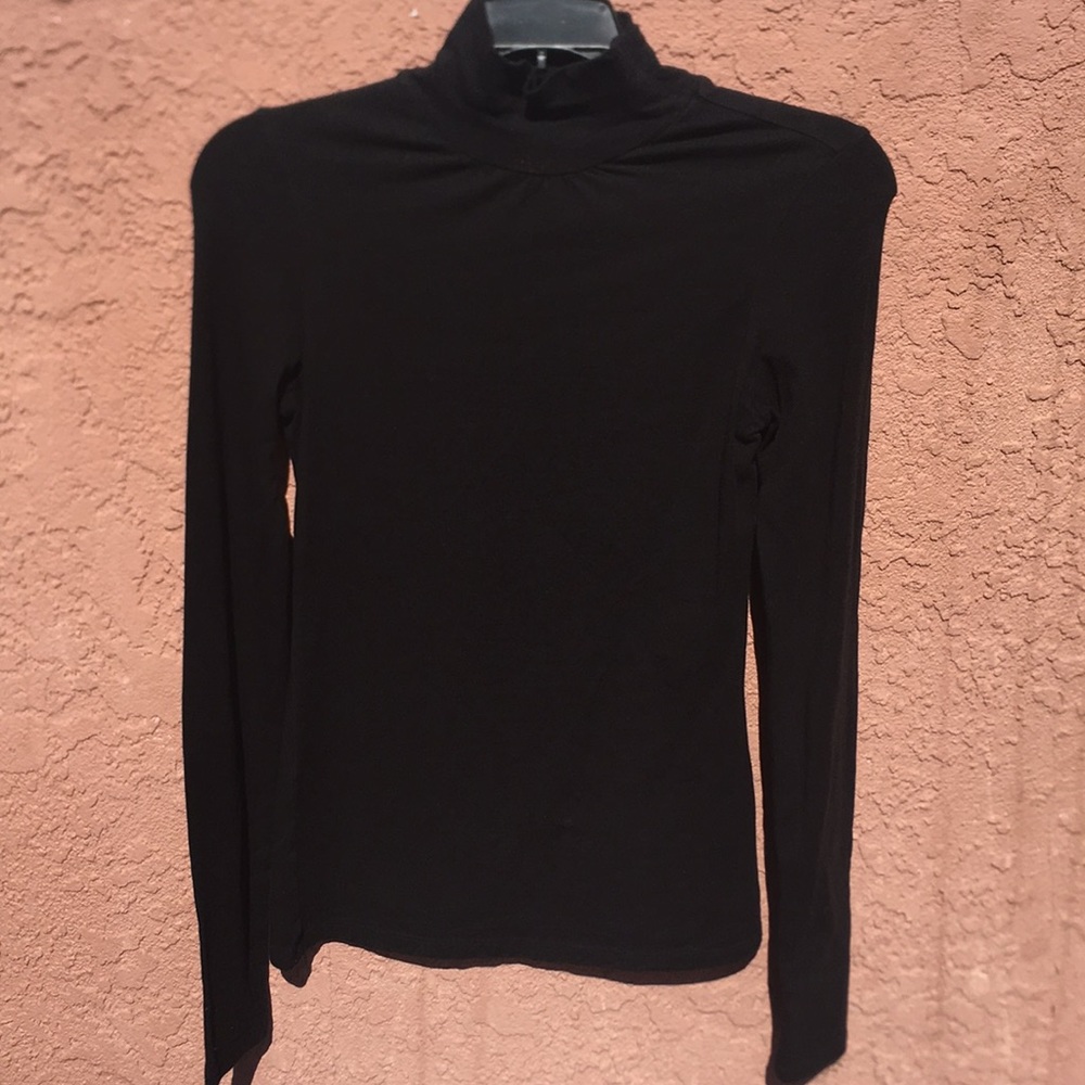 Black form fitting turtleneck